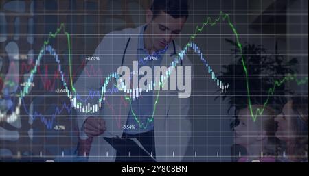 Image of statistics and data processing over caucasian male doctor Stock Photo