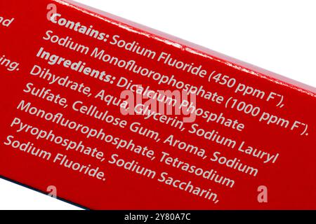 Toothpaste ingredients listed on box of  new look Colgate Cavity Protection toothpaste fluoride toothpaste Stock Photo