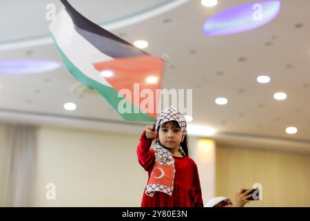 Gaziantep, Turkey. 22 May 2022. Palestinian refugees from Syria commemorate the 74th anniversary of the Nakba Day in the southern Turkish city of Gaziantep. During the ceremony Palestinian children performed traditional Palestinian folk songs and dances, with their parents carrying big keys to symbolise their right of return to their ancestral land in historic Palestine. Nakba Day or Day of Catastrophe is observed on 15 May every year to remember the displacement of Palestinians around the time the Israeli state was founded in 1948. The event in Gaziantep was organised by the Popular Conferenc Stock Photo