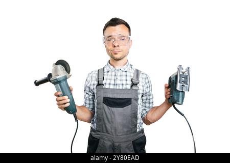 Portrait of a Worker Holding Power Tools Isolated on White Stock Photo