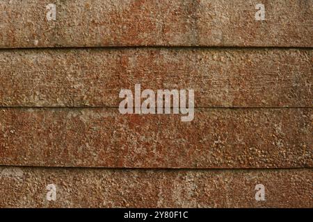 Rusty concrete planks from a wall. Perfect for a texture or pattern in the context of a grungy or urban design. Stock Photo