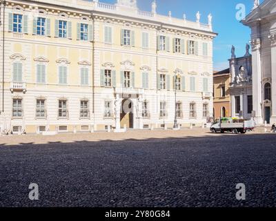 Mantua, Italy September 30th 2024 Cobblestone square with a delivery van in front of the ducal palace in mantua, italy Stock Photo