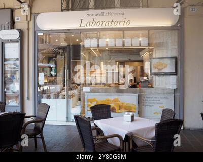 Mantua, Italy September 30th 2024 An italian restaurant is displaying fresh pasta in its storefront window in mantua, italy Stock Photo