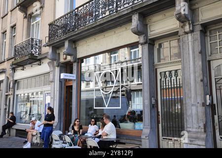 Fashionable Rue Antione Dansaert with high end boutique shops, restaurants & cafes, in Brussels, Belgium. Stock Photo
