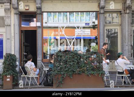 Fashionable Rue Antione Dansaert with high end boutique shops, restaurants & cafes, in Brussels, Belgium. Stock Photo