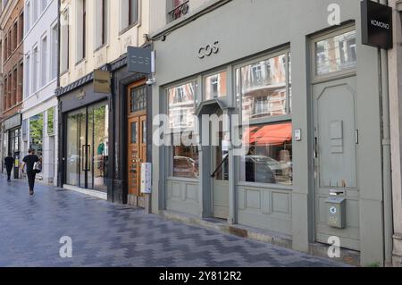 Fashionable Rue Antione Dansaert with high end boutique shops, restaurants & cafes, in Brussels, Belgium. Stock Photo