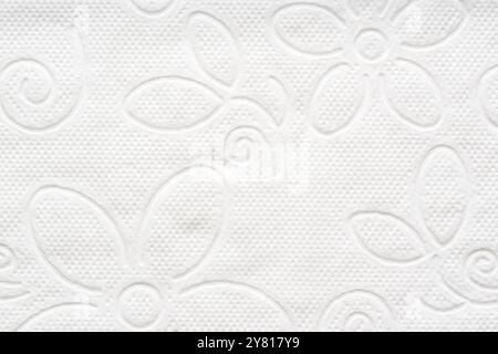 White toilet paper texture with floral pattern used in toilet Stock Photo
