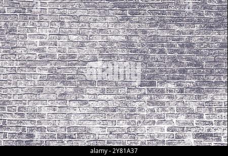 The paper depicts an old brick wall Stock Photo