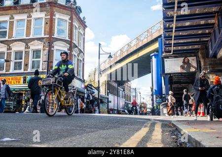 LONDON- SEPTEMBER 13, 2024: Candid street view of Brixton market shop retailers. Vibrant and multicultural area of Lambeth, south west London Stock Photo