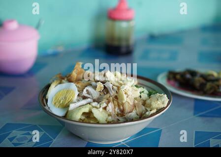 bubur ayam or chicken porridge. traditional food from cianjur indonesia Stock Photo