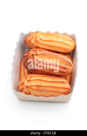 Eclairs  with whipped cream isolated on white Stock Photo