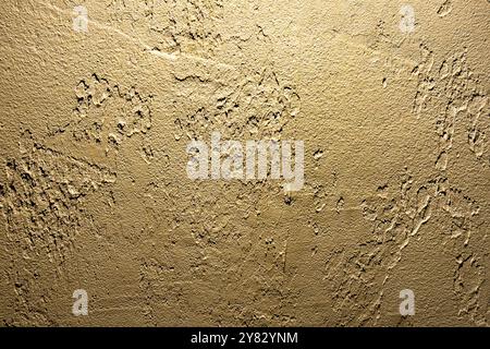 Golden brown cement rough wall texture. Abstract architectural design background Stock Photo