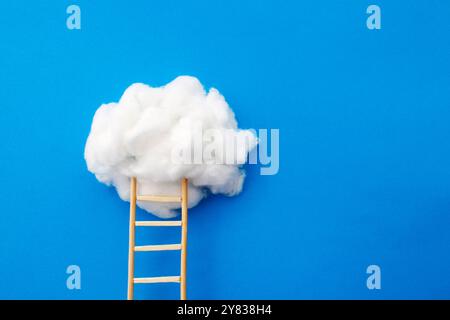Ladder that allows you to climb to the cloud Stock Photo