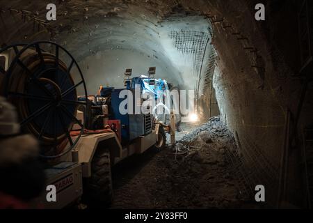 Prague Metro D Building Process. Machine application of plaster on the wall. The machine sprays plaster on the wall. Stock Photo