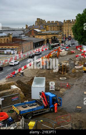 Road improvements work & roadworks for Station Gateway Project (men working, groundworks, machines & machinery) - York, North Yorkshire, England, UK. Stock Photo