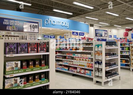 Toronto, Canada - 08-13-2024: Pharmacy with merchandise on shelfs in a supermarket Stock Photo