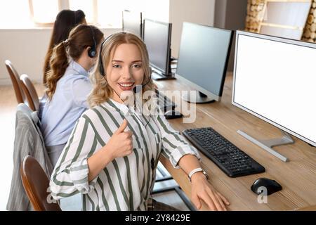 Female technical support agents working in office, top view Stock Photo ...