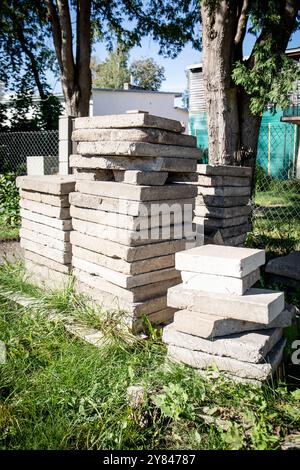 Old concrete slabs. Environmental improvement and construction works. Recycling of construction waste. Stock Photo