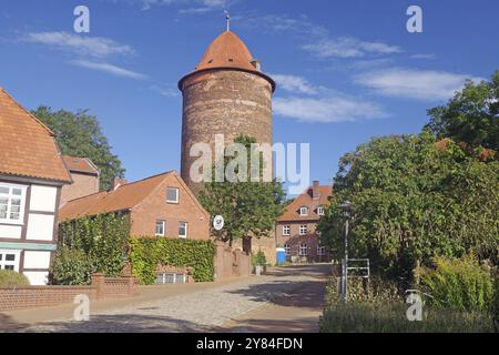 Historic towers and buildings in a rural town with cobblestones, Dannenberg, Wendland, Lower Saxony, Germany, Europe Stock Photo