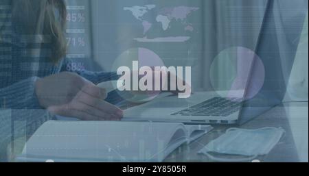 Image of data processing over caucasian woman using laptop Stock Photo