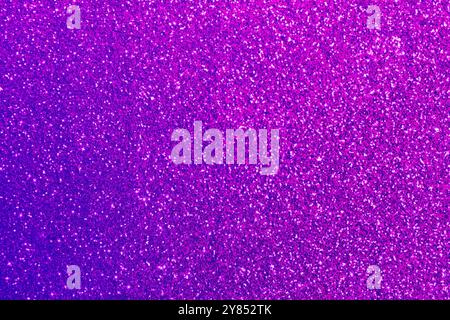 Shiny violet and blue glitter, top view. Halloween background Stock Photo