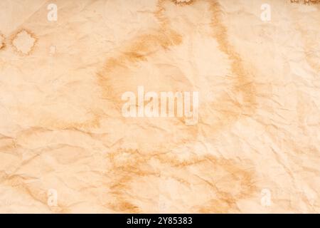 Old texture brown yellow style vintage cardboard sheet of empty paper background. Stock Photo