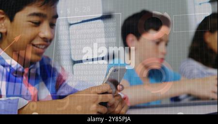 Holding smartphone, students with binary code and data processing image over them Stock Photo