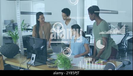 Business data analytics image over diverse team collaborating in modern office Stock Photo