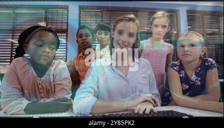 Computer code image over diverse children and teacher in classroom Stock Photo