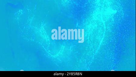 Image of waves of blue particles moving on blue background Stock Photo