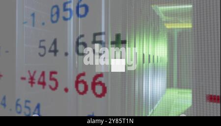 Image of data loading squares and financial data processing over server room Stock Photo