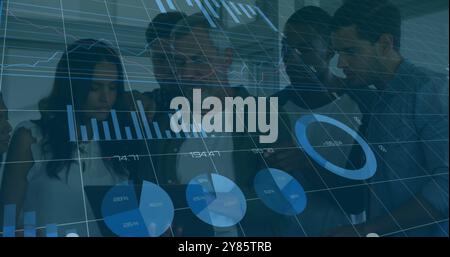 Image of financial data processing over diverse colleagues discussing work in office Stock Photo