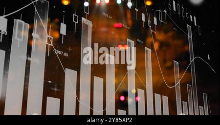 Financial data chart image over blurred lights background Stock Photo