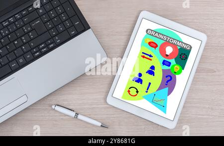 Brainstorming concept shown on a digital tablet Stock Photo