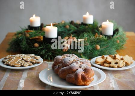 Traditional Czech and Slovak Christmas sweet plaited bread called vanocka (in Slovak vianocka). Christmas pastry on a festively set table Stock Photo