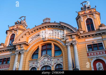 The Romanian National Theatre and Opera House lit by evening sunshine, Cluj-Napoca, Transylvania, Romania Stock Photo