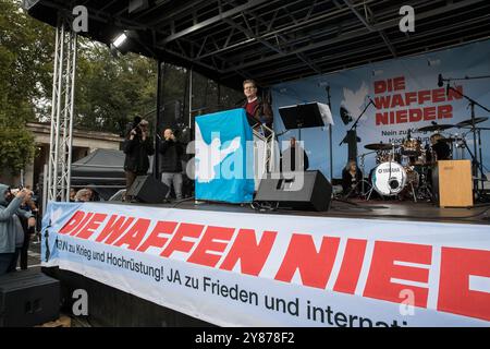 Berlin, Germany. 3rd Oct, 2024. Thousands of demonstrators took to the streets in Berlin on October 3, 2024, Germany's Unity Day, answering the nationwide call by the ''Never Again War'' initiative for a peace demonstration. Protesters rallied against the stationing of U.S. missiles in Germany, the wars in Ukraine and the Middle East, and Germany's arms deliveries to Ukraine and Israel. The event, which culminated at the Victory Column in Berlin's Tiergarten, was marked by a mix of peace activists, anti-war protesters, and pro-Palestinian demonstrators. Organizers estimated around 30,000 par Stock Photo