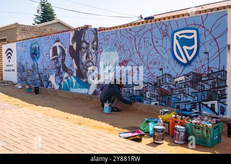 Johannesburg, South Africa - September 08, 2022: Artist creates graffiti Orlando West, Soweto, Johannesburg, South Africa Stock Photo