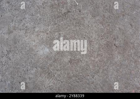 Old gray concrete surface with subtle textures and patterns. Stock Photo
