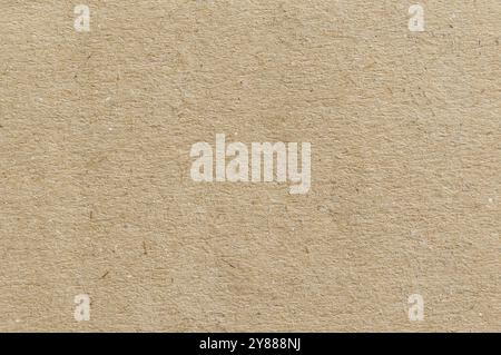 Recycled paper background showcasing a textured, eco-friendly surface ideal for art and design projects in various creative settings Stock Photo