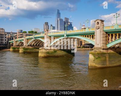 Southwark Bridge crossing the River Thames, London, UK Stock Photo