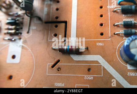 Resistor on the industrial electronic circuit board. Electrical resistor. Stock Photo