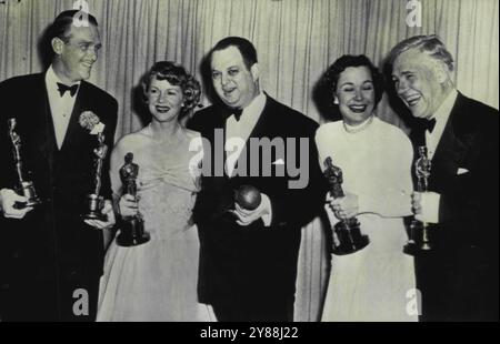 CLAIRE TREVOR holding her Best Supporting Actress Academy Award for KEY ...