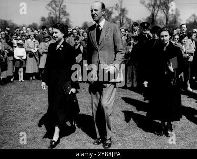 Queen At Badminton Horse Trials -- Queen Elizabeth II (left), and Princess Margaret accompanied by the Duke of Beaufort, Master of the horse, are seen as they arrived to watch the dressage event of the Olympic horse trials which opened at Badminton, Gloucestershire, today April 22nd.The Royal Party are staying with the Duke and Duchess of Beaufort at Badminton hall. As Court mourning for Queen Mary has not yet ended, the visit is an informal one - as it was last year, when the court was still in mourning for King George VI. May 07, 1953. (Photo by Associated Press Photo). Stock Photo