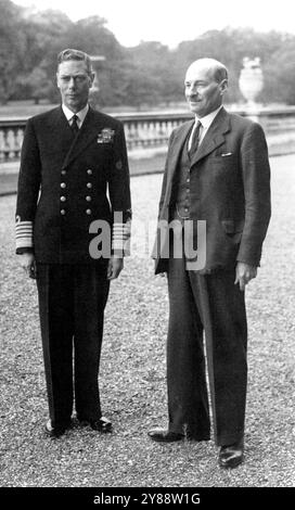 Mr. Clement Attlee - Britain's New Prime Minister Sees The King -- The King with Mr Clement Attlee at Boukingham Palace, London.Mr Clement Attlee, Britain's new Labour Prime Minister, went to see the King to submit to His Majesty the list of the new Labour Government. July 30, 1945. Stock Photo