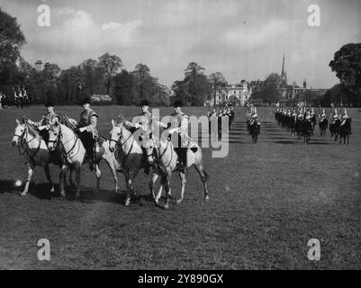 Cavalry Rehearse Musical Drive -- Kensington Palace formed a background for a full dress rehearsal by the Household Cavalry this morning of the famous Musical Ride which they will perform at shows throughout the country this summer. They held their rehearsal in the paddock of Kensington Palace. May 3, 1955. Stock Photo