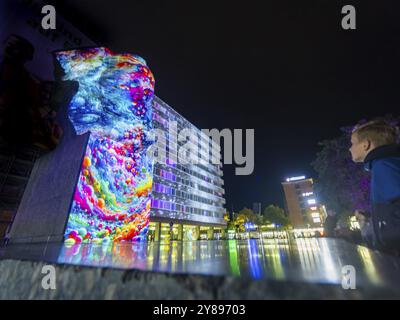 Vanessa Cardui Karl-Marx-Monument, Hands off!, The 2nd edition of Light our Vision under the motto LICHT.MACHT.PLATZ. is inspiring with an internation Stock Photo