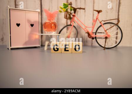 GEO WORD. text on wooden blocks on a wooden background. Stock Photo