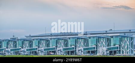 Balikpapan, Indonesia - September 26th, 2024. Sultan Aji Muhammad Sulaiman Sepinggan Balikpapan International Airport terminal with multiple jet bridg Stock Photo