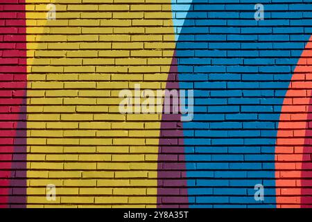 Multi colored abstract textured background. Colored brick wall backdrop Stock Photo